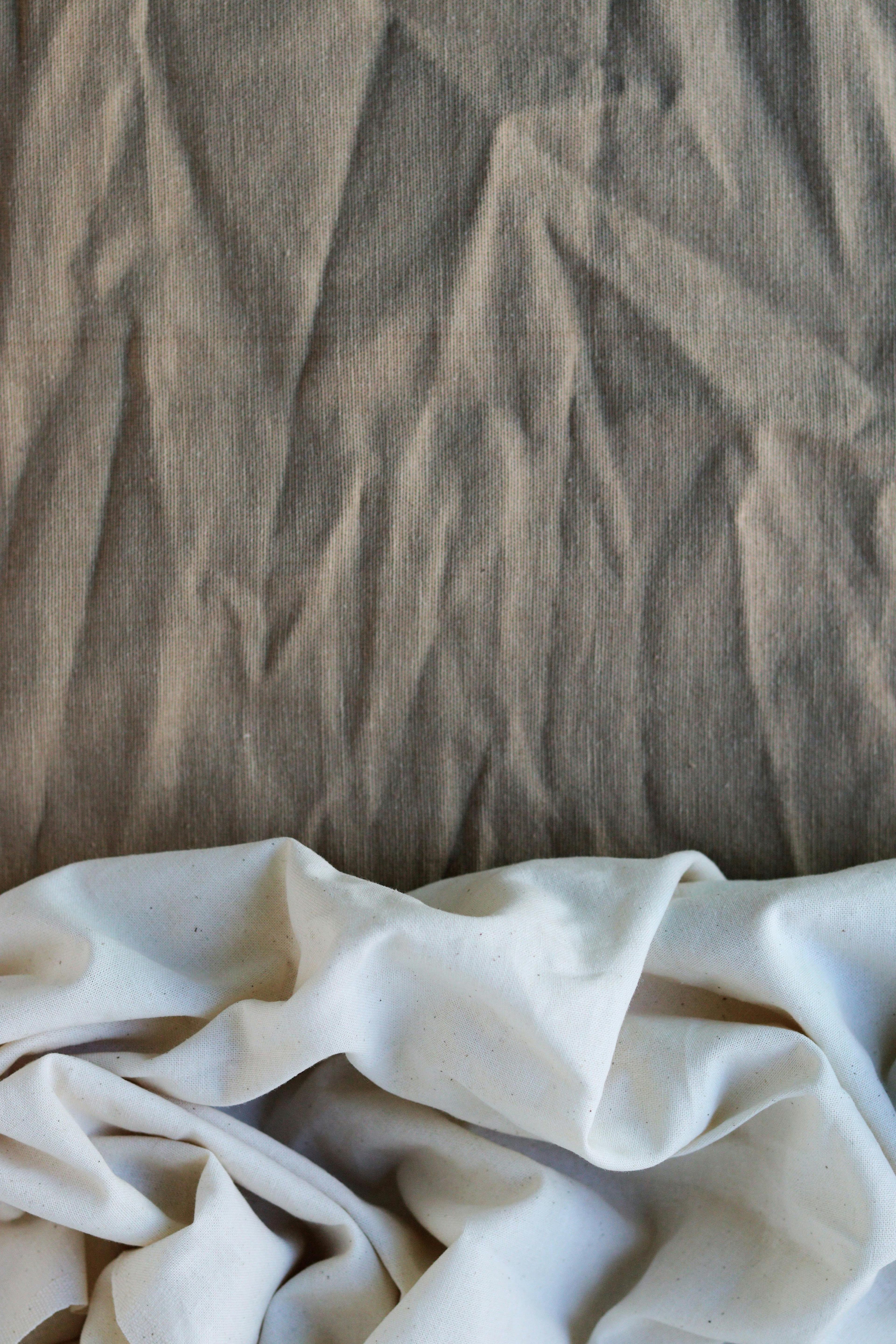 Folds of natural organic cotton, a study in texture.